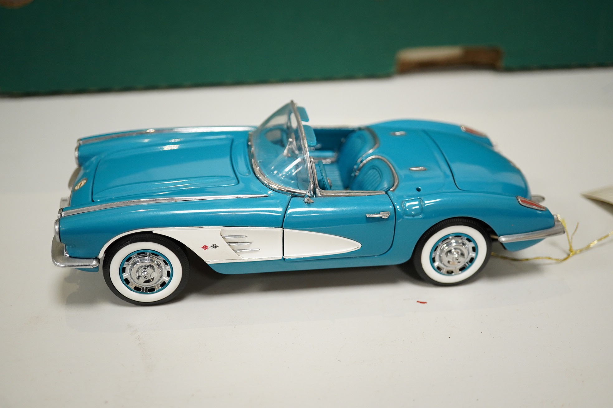 Five boxed Franklin Mint diecast 1:24 scale vehicles; a 1952 Jaguar XK120, a Rolls Royce Silver Ghost, a Rolls-Royce silver ghost limousine, a Mercedes Benz 300SL Gullwing, a Corvette Roadster, plus a boxed SMTS 1:43 whi